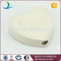 heart shape ceramic decoration with love relief